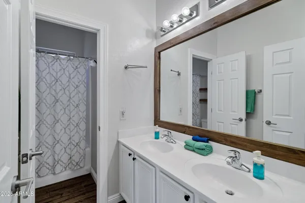 a bathroom with a shower curtain