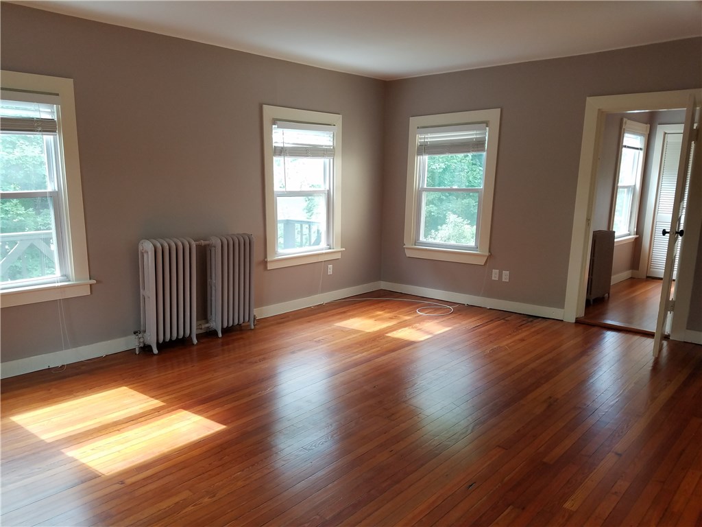 49 Merton Road, Unit 2 Newport, RI 02840 - Photo 15 of 42 Living Room/Dining Area view to office and 2nd bedroom