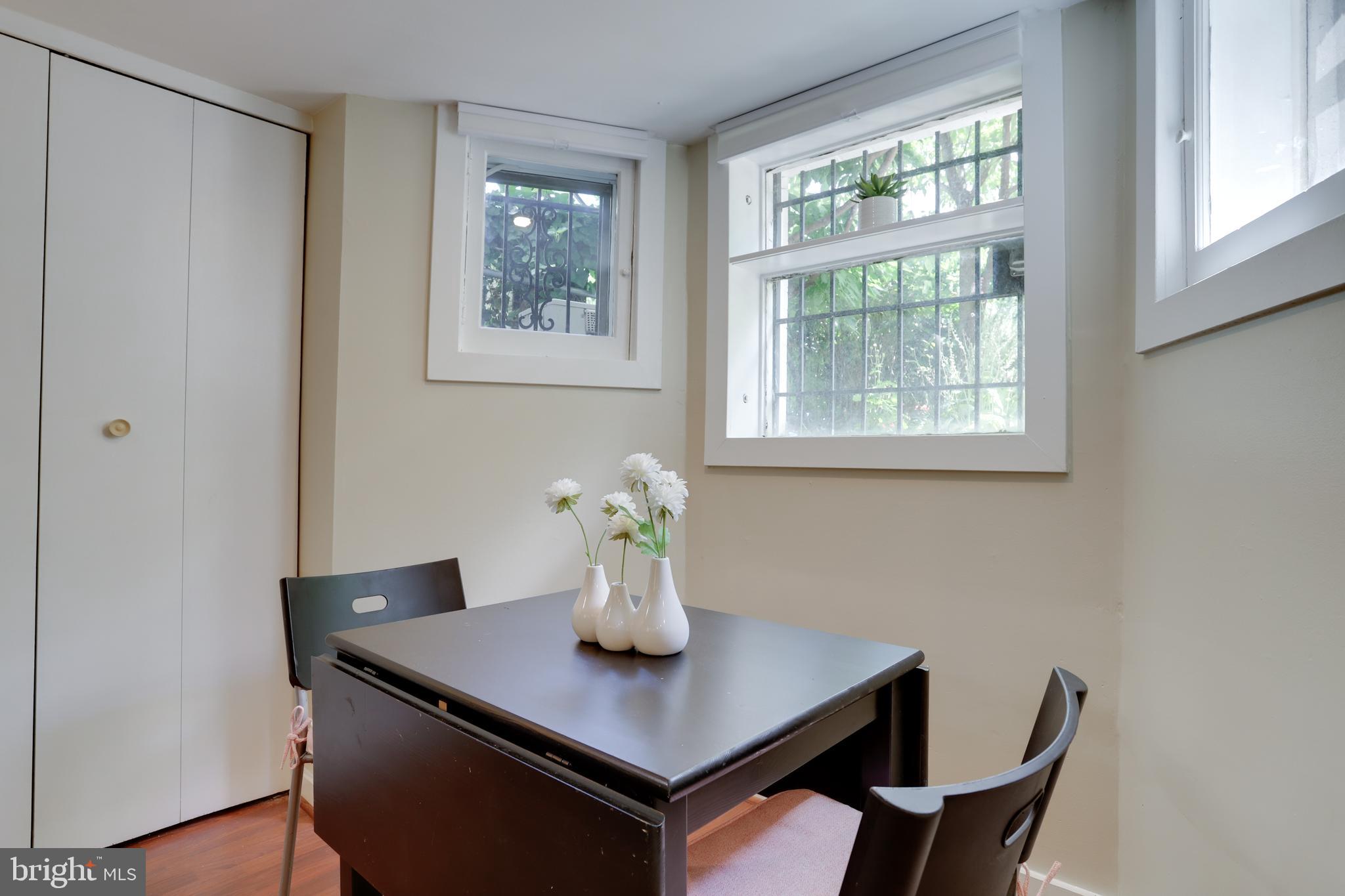 1010 Independence Avenue Southeast, Unit B Washington, DC 20003 - Photo 7 of 17 a view of a dining room with furniture and wooden floor