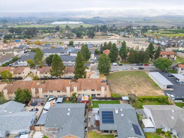 an aerial view of a city with lots of residential buildings