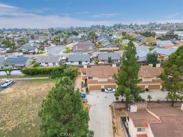 an aerial view of a city with lots of residential buildings