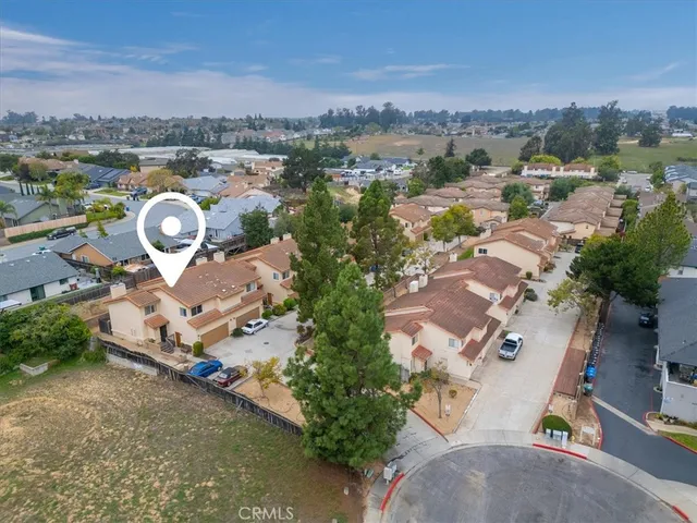 an aerial view of a house with a outdoor space