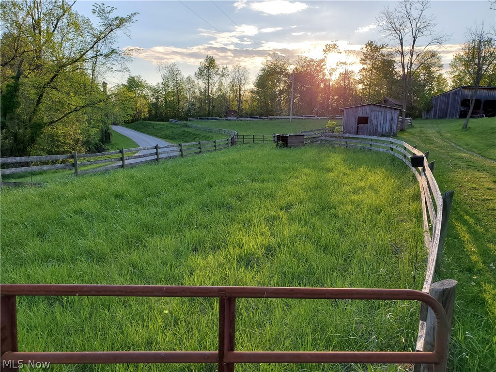40081 Pleasant Ridge Road Graysville, OH 45734 - Photo 26 of 29 View of pasture and barns around the bend.