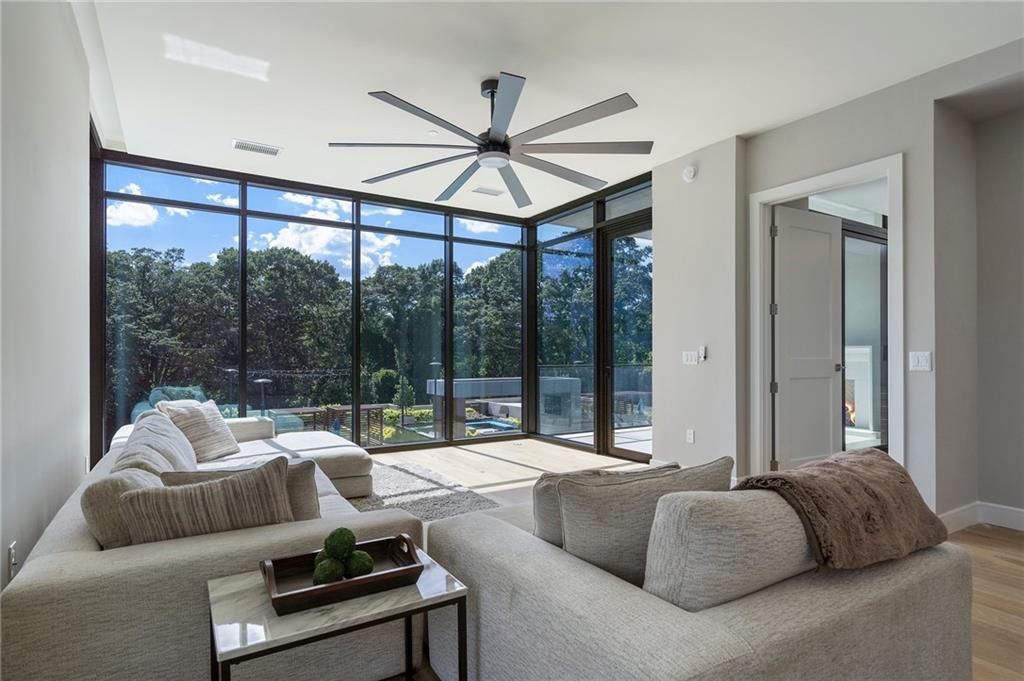 2520 Peachtree Road Northwest, Unit 403 Atlanta, GA 30305 - Photo 19 of 52 a living room with furniture and a large window