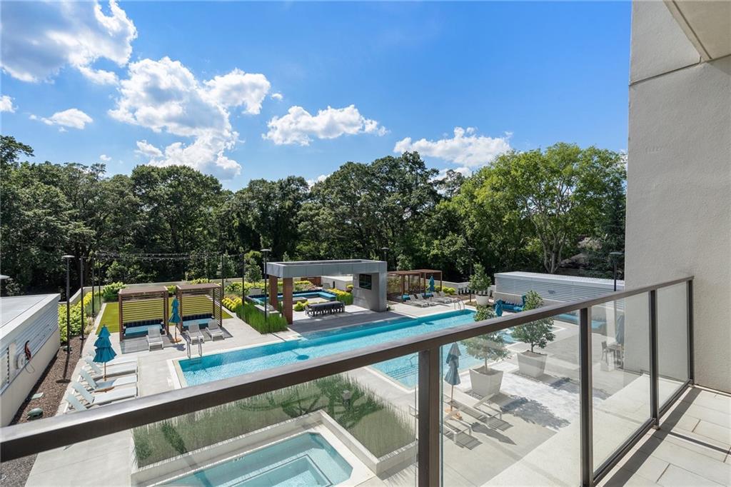 2520 Peachtree Road Northwest, Unit 403 Atlanta, GA 30305 - Photo 22 of 52 a view of a balcony with chairs