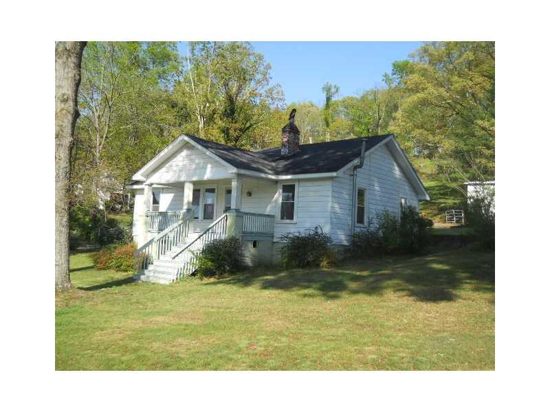 3121 Maple Road Southeast Lindale, GA 30147 - Photo 1 of 1 a view of a house with a yard