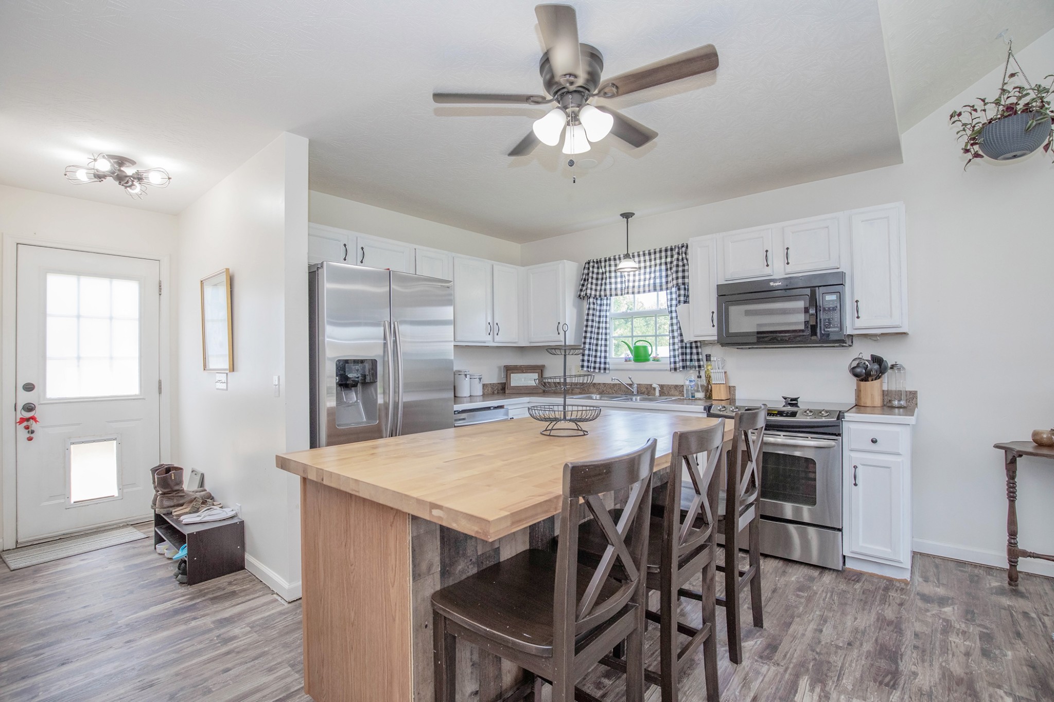 148 Filly Lane Springfield, TN 37172 - Photo 11 of 33 a view of kitchen with cabinets table and chairs