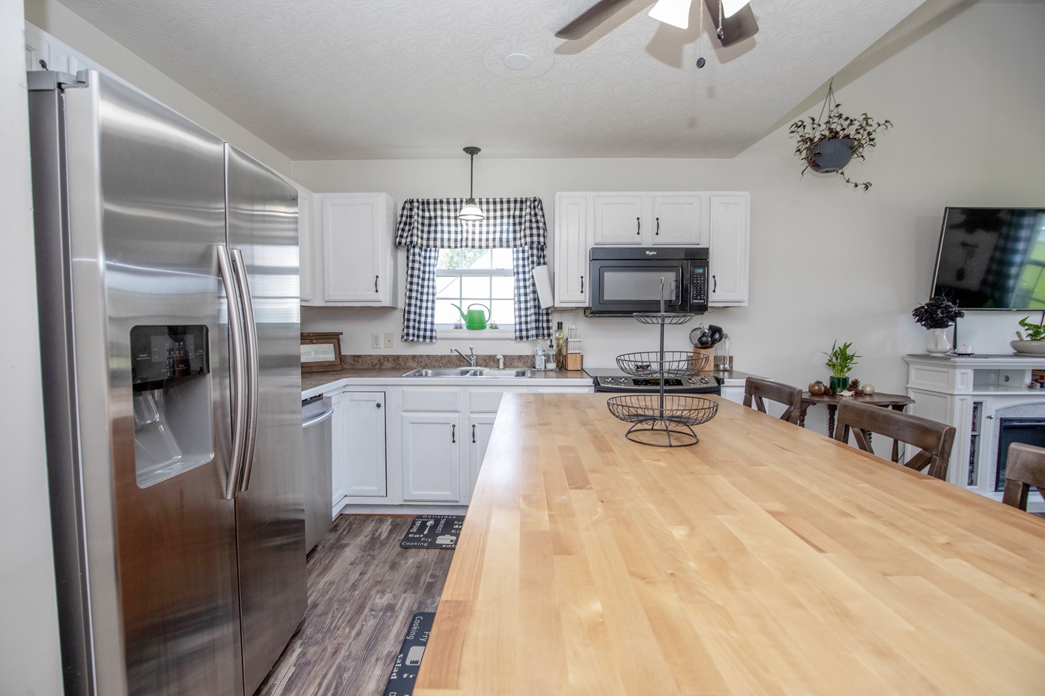 148 Filly Lane Springfield, TN 37172 - Photo 14 of 33 a kitchen with granite countertop a refrigerator stove top oven a sink and dishwasher