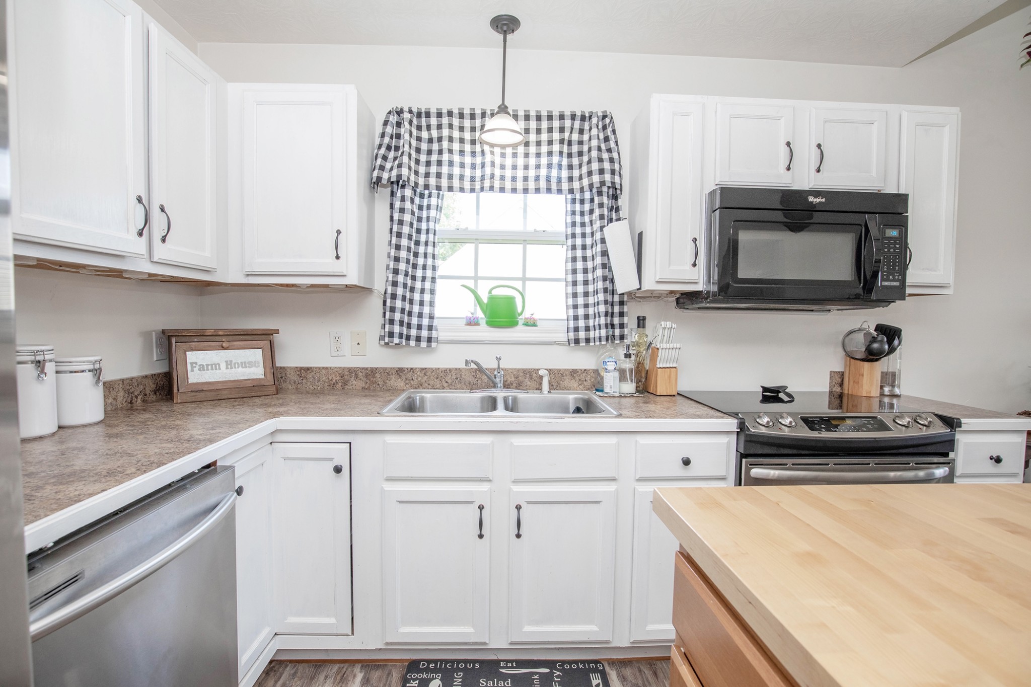 148 Filly Lane Springfield, TN 37172 - Photo 15 of 33 a kitchen with cabinets appliances a sink and a window