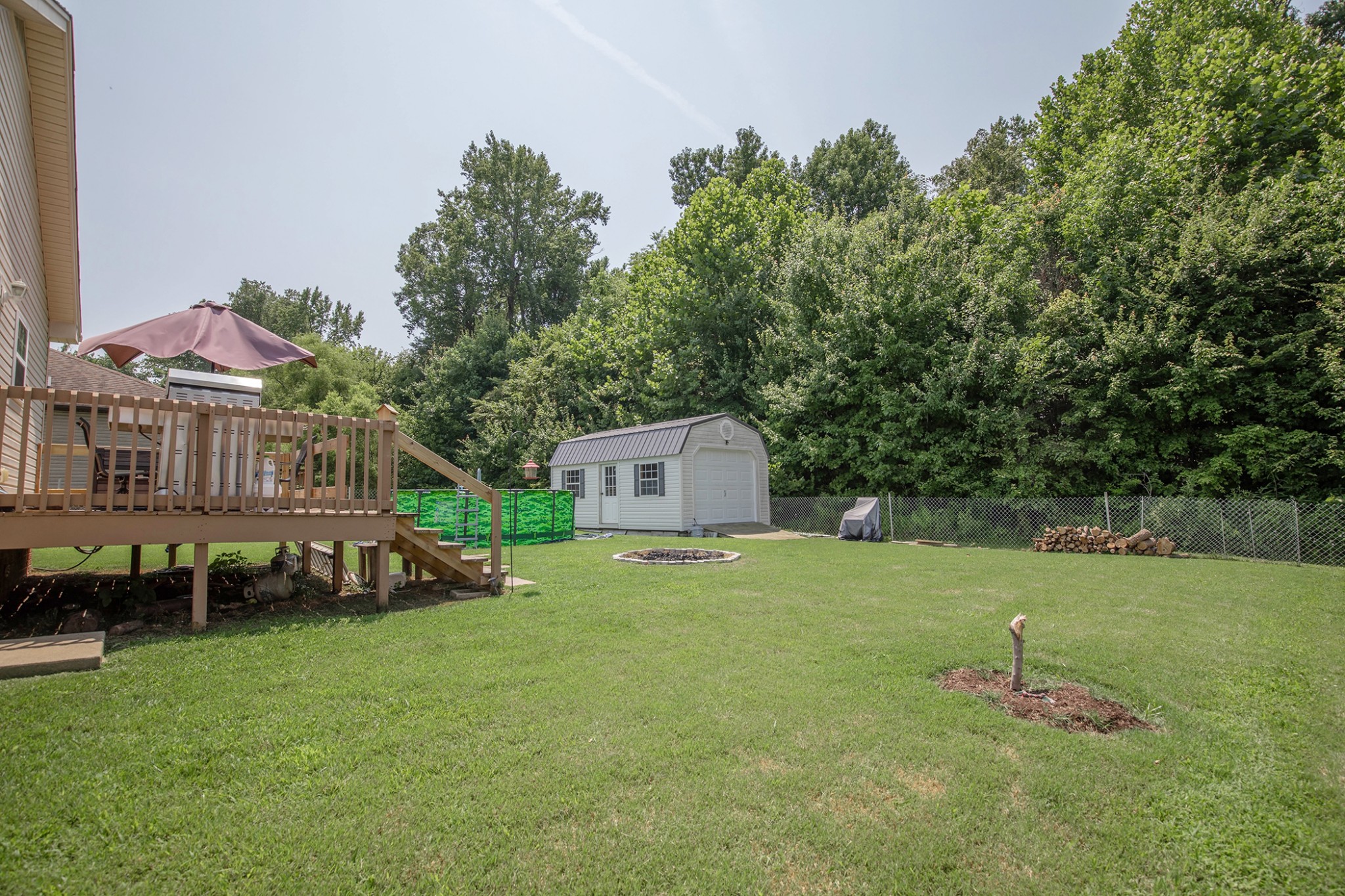 148 Filly Lane Springfield, TN 37172 - Photo 29 of 33 a backyard of a house with table and chairs