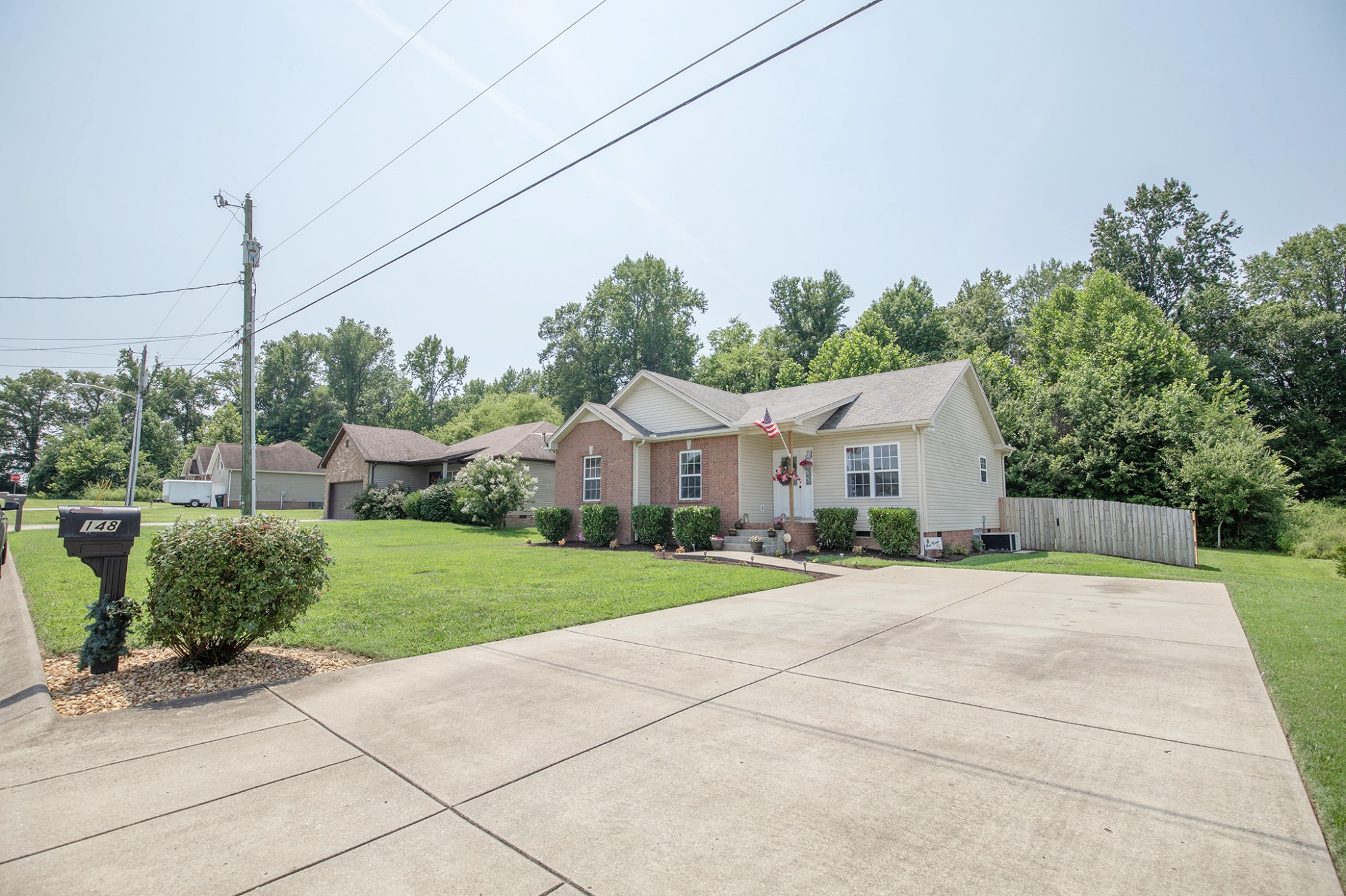 148 Filly Lane Springfield, TN 37172 - Photo 4 of 33 a front view of a house with a yard and trees