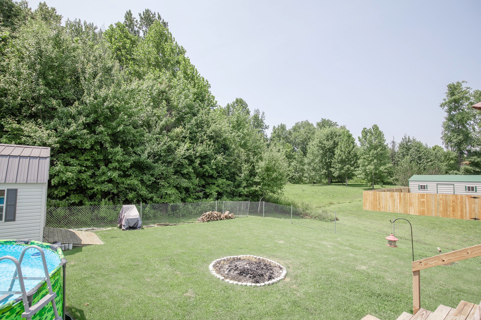 148 Filly Lane Springfield, TN 37172 - Photo 32 of 33 a view of a backyard with plants and a lake