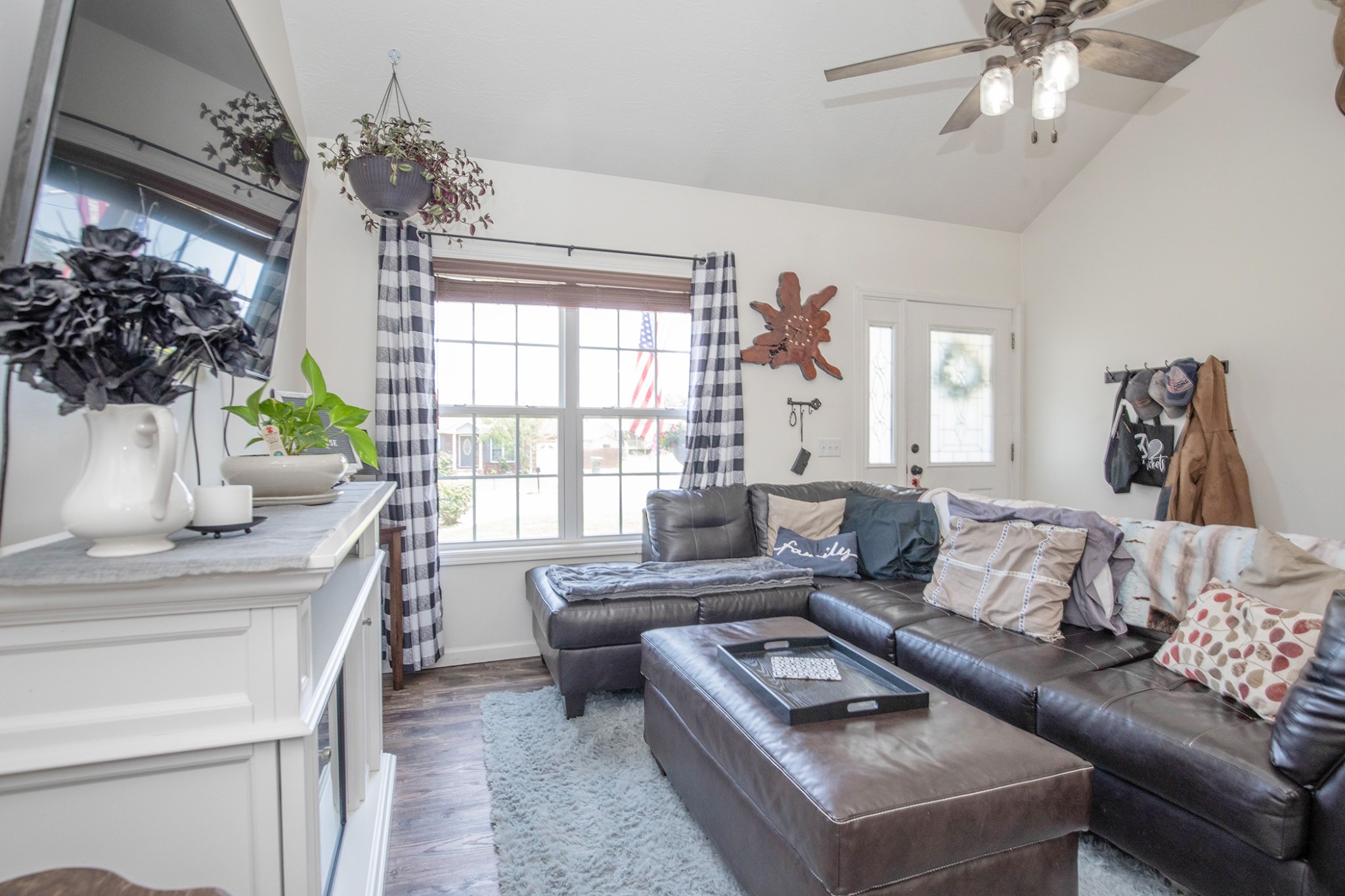 148 Filly Lane Springfield, TN 37172 - Photo 7 of 33 a living room with furniture and a chandelier
