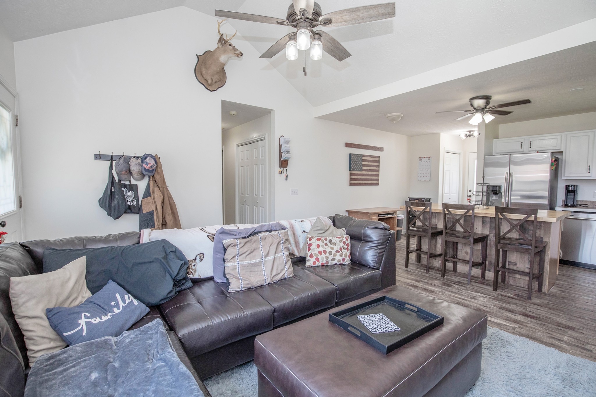 148 Filly Lane Springfield, TN 37172 - Photo 8 of 33 a living room with furniture and a chandelier