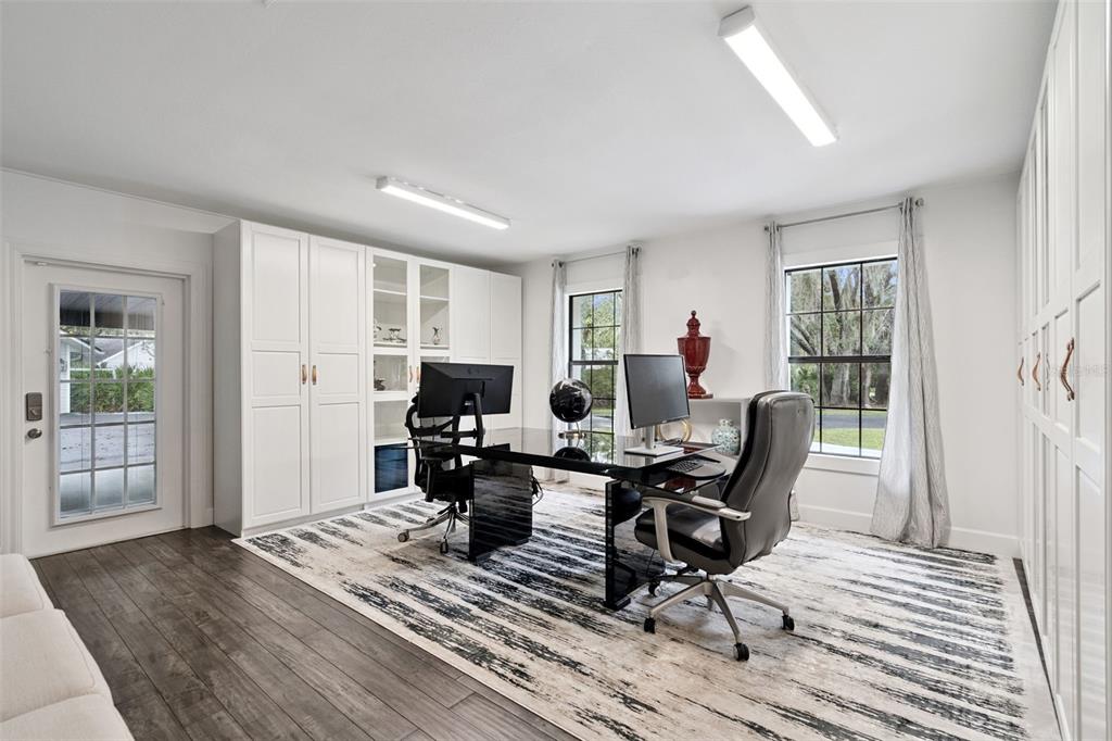 298 Lake Markham Road Sanford, FL 32771 - Photo 15 of 50 a living room with furniture and wooden floor