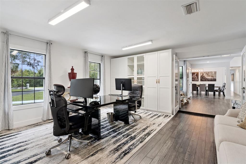 298 Lake Markham Road Sanford, FL 32771 - Photo 16 of 50 a living room with furniture and wooden floor
