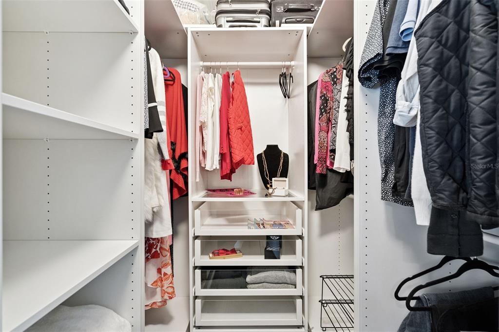 298 Lake Markham Road Sanford, FL 32771 - Photo 21 of 50 a view of walk in closet with clothes and shoes