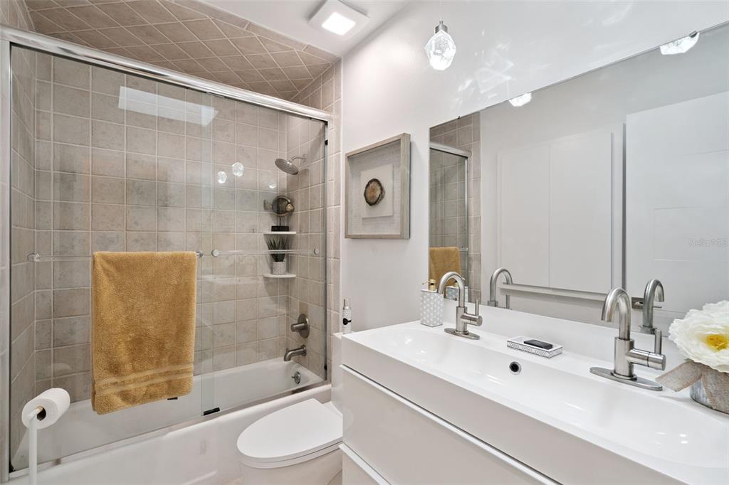 298 Lake Markham Road Sanford, FL 32771 - Photo 23 of 50 a bathroom with a sink a toilet and shower