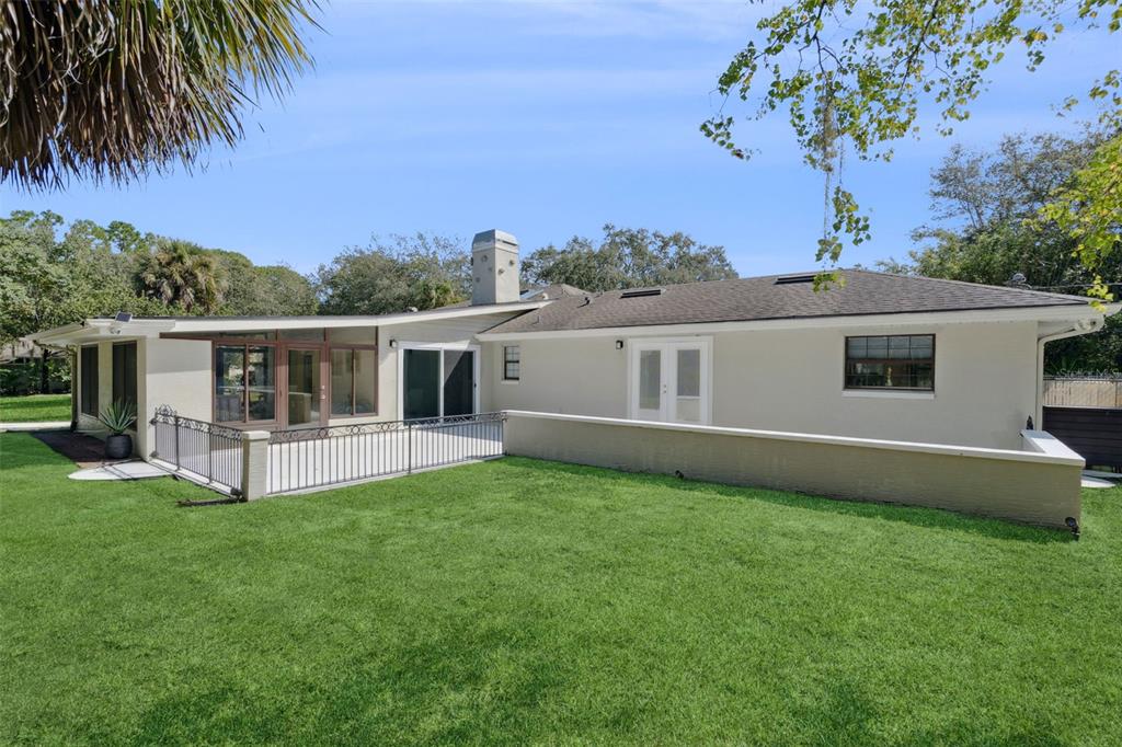 298 Lake Markham Road Sanford, FL 32771 - Photo 27 of 50 a view of a house with a yard