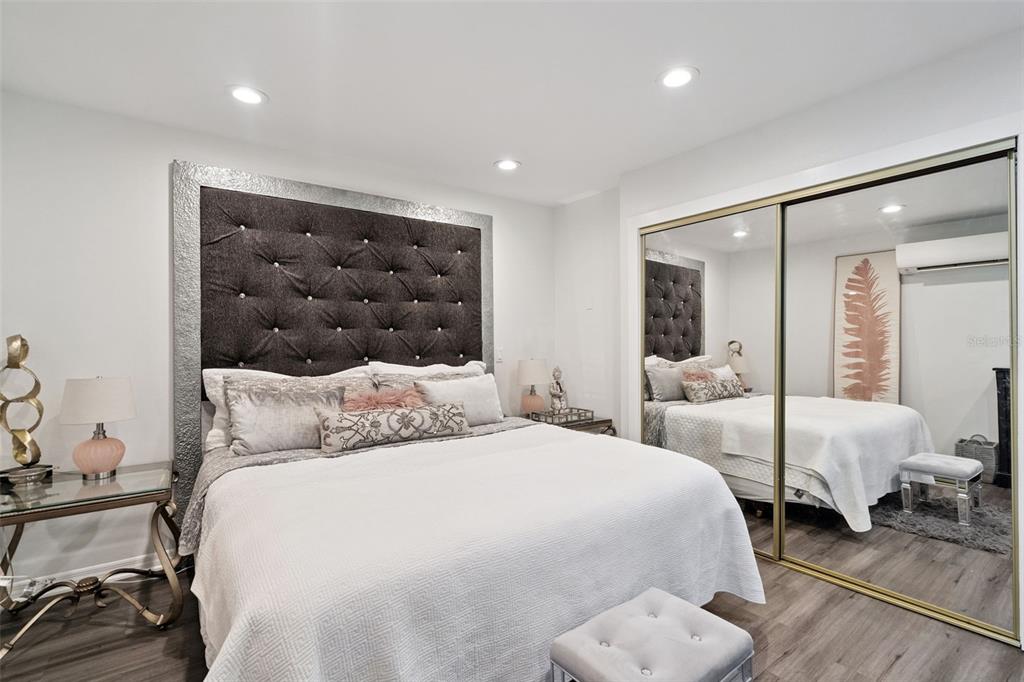 298 Lake Markham Road Sanford, FL 32771 - Photo 39 of 50 a bedroom with a bed and a couch