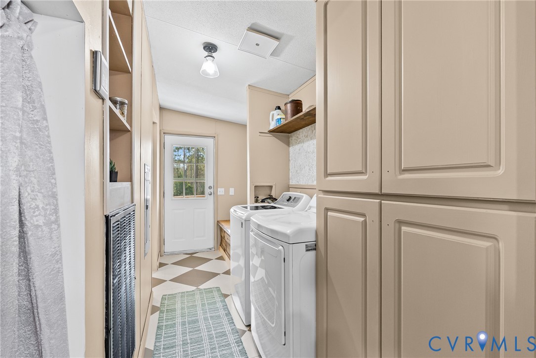 299 Arvin Store Road Keysville, VA 23947 - Photo 14 of 45 a bathroom with a sink and mirror with bathtub