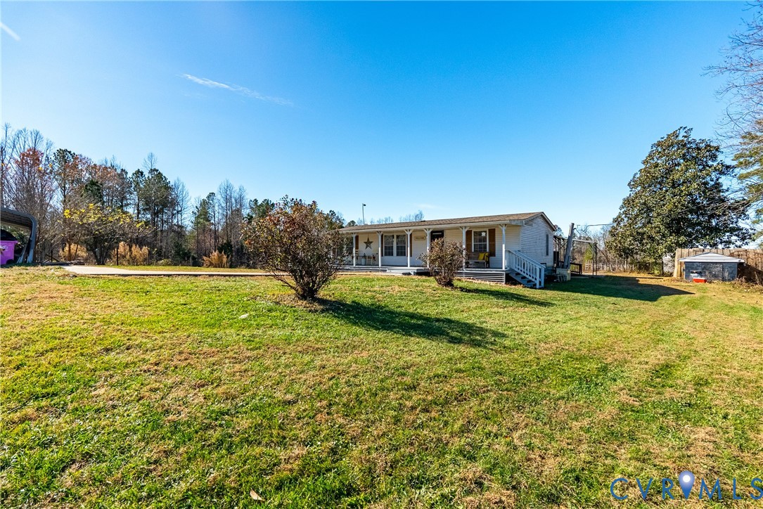 299 Arvin Store Road Keysville, VA 23947 - Photo 31 of 45 a house view with swimming pool in front of it