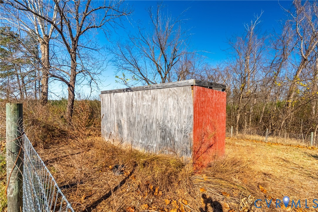 299 Arvin Store Road Keysville, VA 23947 - Photo 32 of 45 a view of backyard with wooden fence