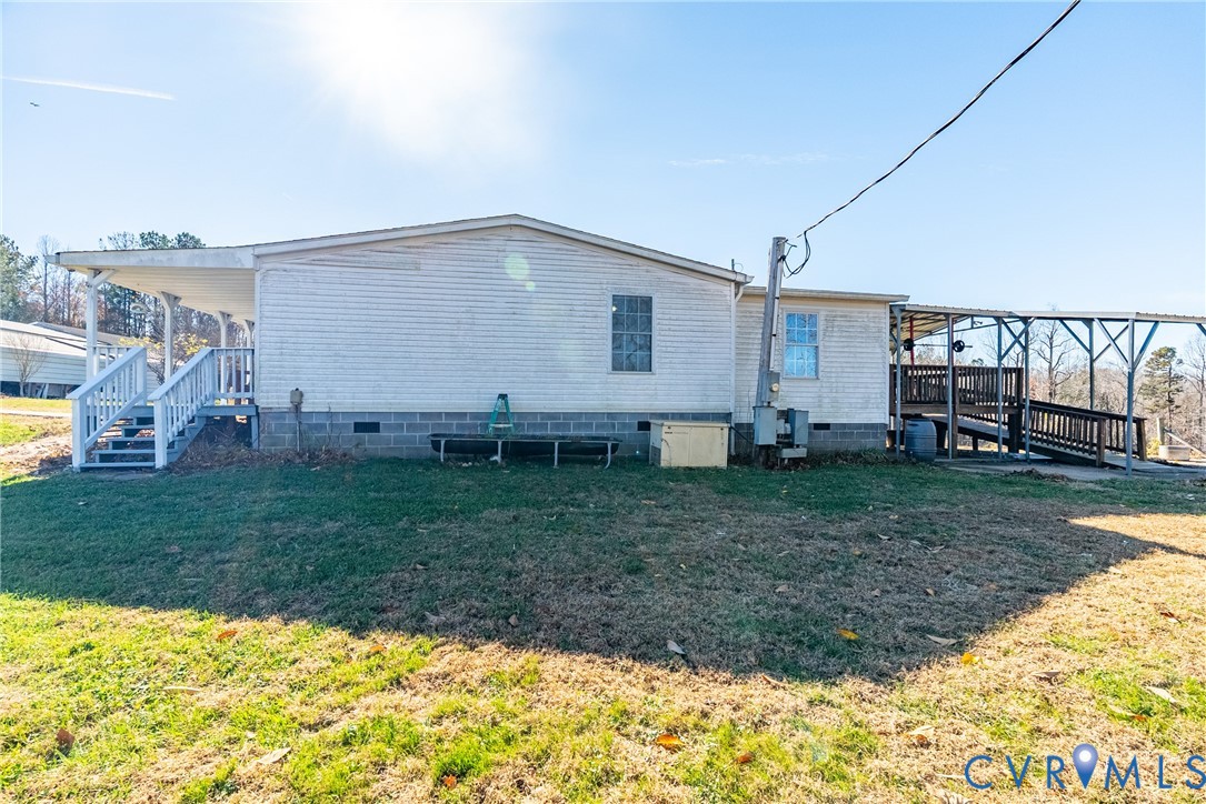 299 Arvin Store Road Keysville, VA 23947 - Photo 33 of 45 a view of a backyard with wooden fence