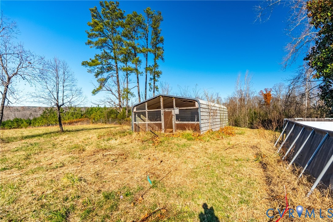 299 Arvin Store Road Keysville, VA 23947 - Photo 39 of 45 a bathroom with a sink and a yard