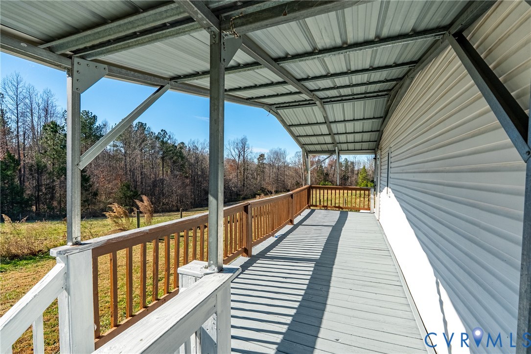 299 Arvin Store Road Keysville, VA 23947 - Photo 40 of 45 a view of balcony with wooden floor