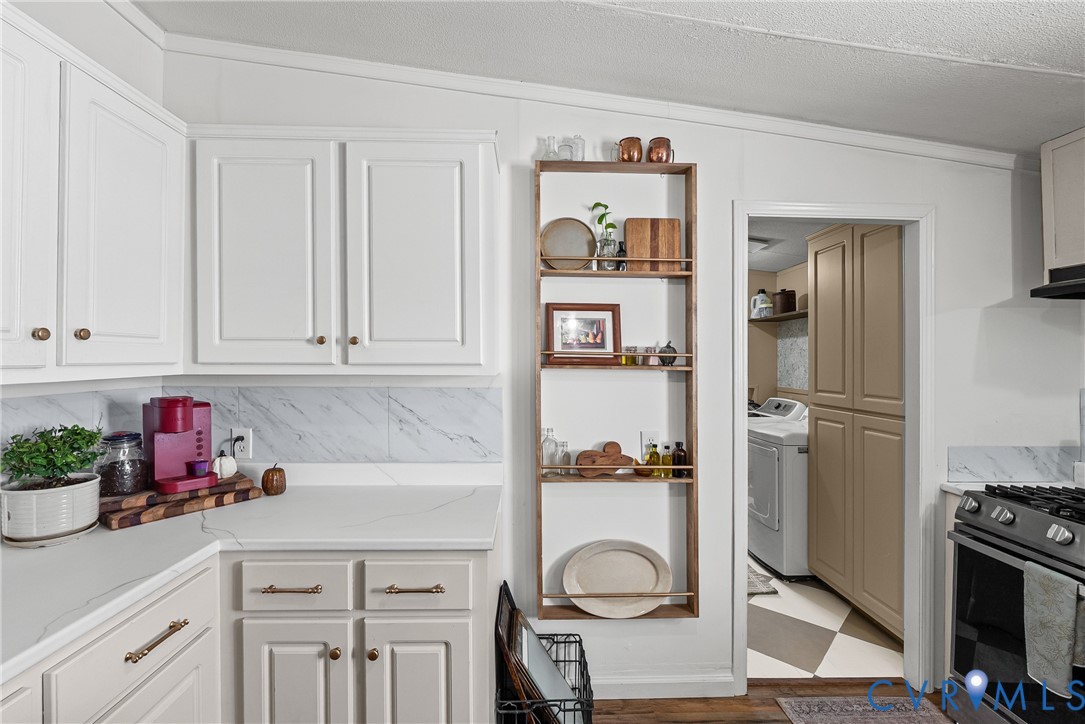 299 Arvin Store Road Keysville, VA 23947 - Photo 5 of 45 a kitchen with stainless steel appliances granite countertop a refrigerator sink and stove