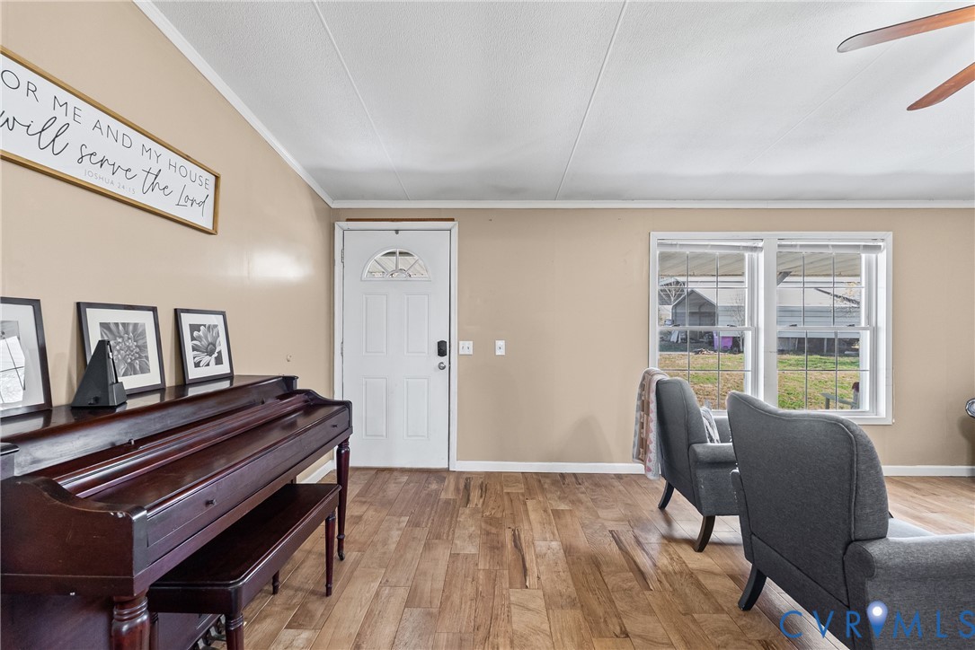 299 Arvin Store Road Keysville, VA 23947 - Photo 8 of 45 a view of a livingroom with furniture and a piano