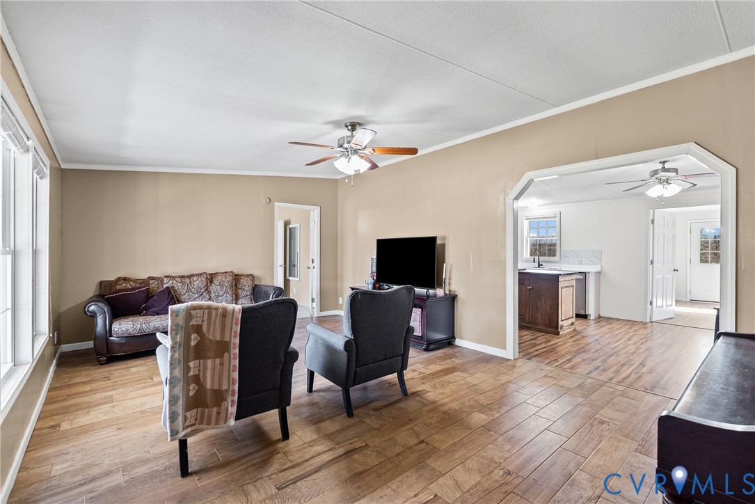 299 Arvin Store Road Keysville, VA 23947 - Photo 9 of 45 a living room with furniture and a flat screen tv