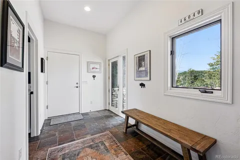 a room with furniture and a window