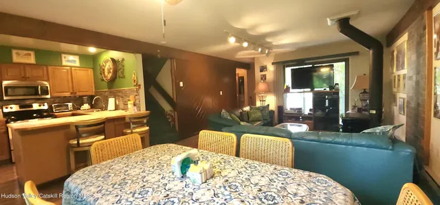 a en suite bathroom with a sink a mirror and a bathtub