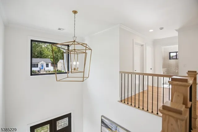 a view of a hallway with windows