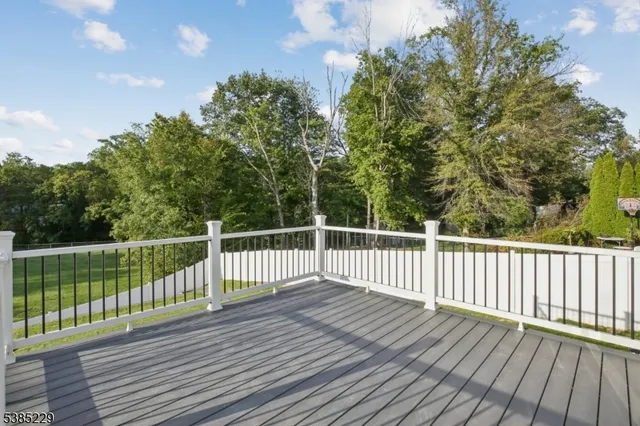a view of a wooden roof deck