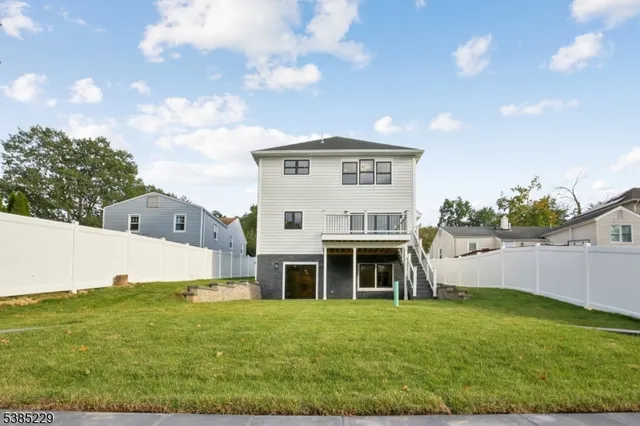 a view of house with outdoor space and seating area