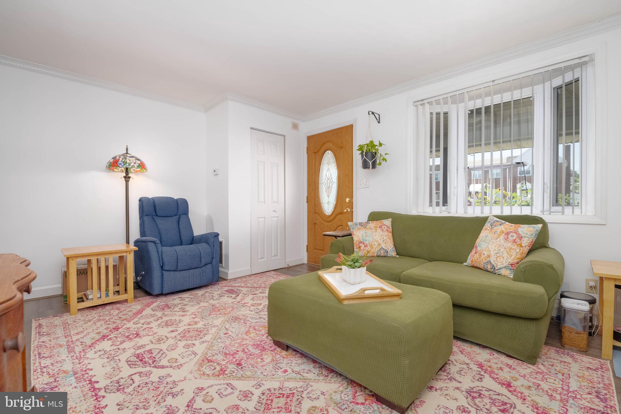 2302 Searles Road Dundalk, MD 21222 - Photo 5 of 35 a living room with furniture and a window