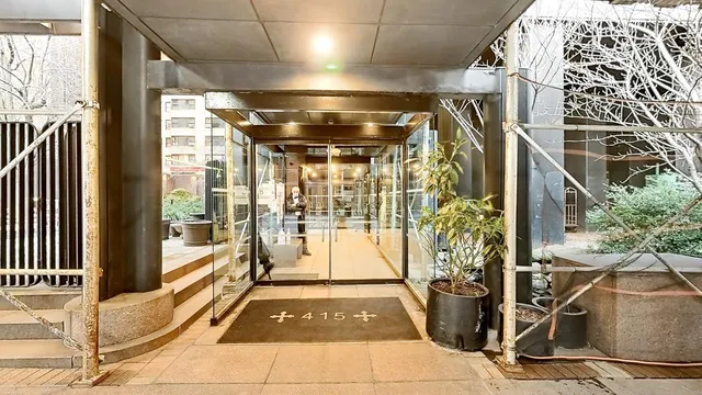 a view of dining room with furniture and wooden floor