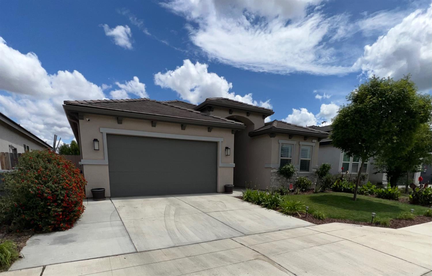 889 Coloma Place Madera, CA 93637 - Photo 2 of 61 a house with a outdoor space