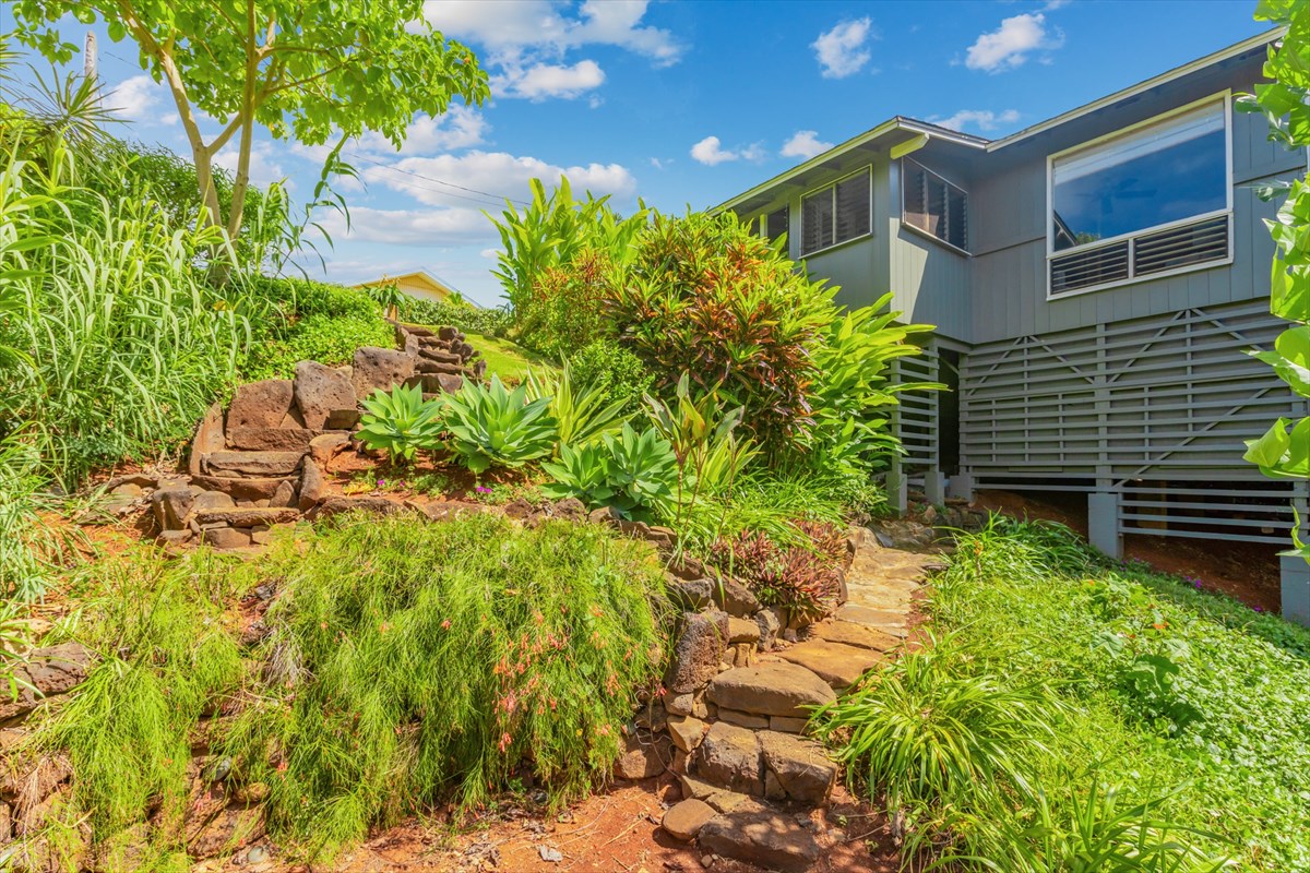 4826 Pelehu Road Kapaa, HI 96746 - Photo 1 of 25 a backyard of a house