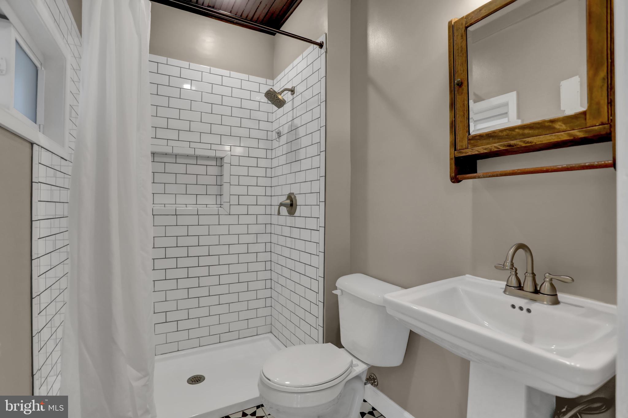 332 Radnor Road Baltimore, MD 21212 - Photo 19 of 47 First Floor Full Bath off of Mud Room