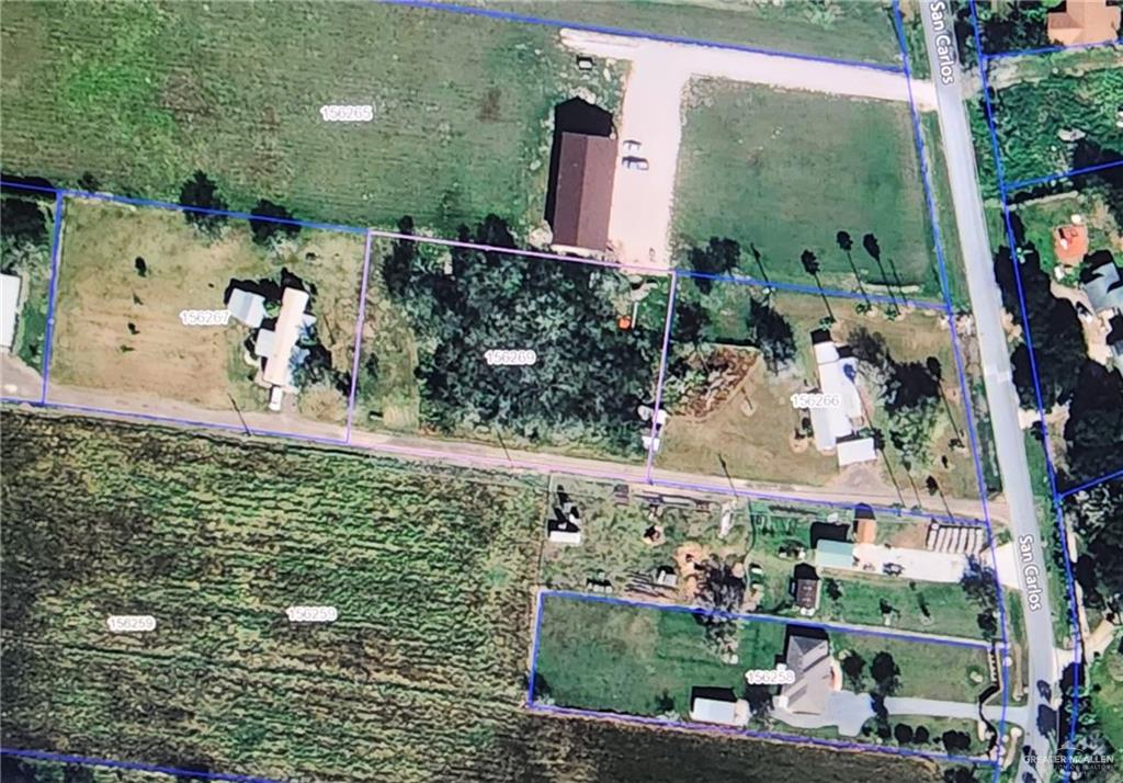 32656 San Carlos Road, Unit 2 Los Fresnos, TX 78566 - Photo 3 of 15 an aerial view of a house