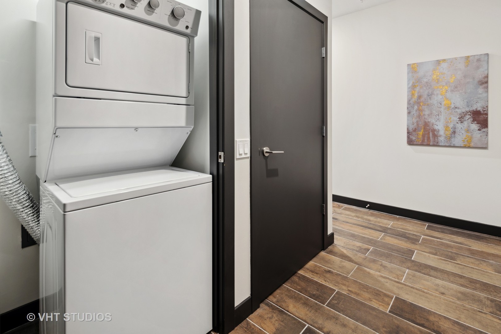 171 North Aberdeen Street, Unit 806 Chicago, IL 60607 - Photo 12 of 18 a utility room with dryer and washer