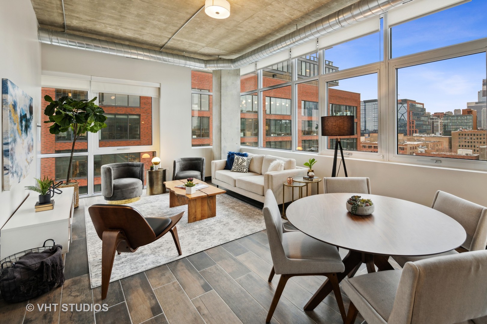 171 North Aberdeen Street, Unit 806 Chicago, IL 60607 - Photo 3 of 18 a living room with furniture and a floor to ceiling window