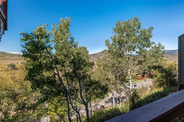 a view of a lake from a balcony
