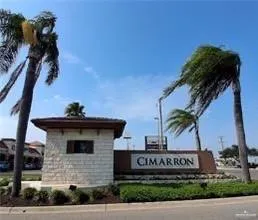 a view of a street with a building in the background