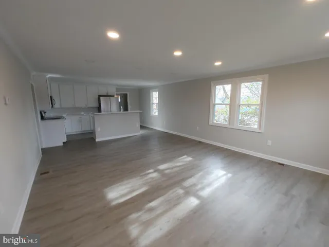 a view of kitchen and windows