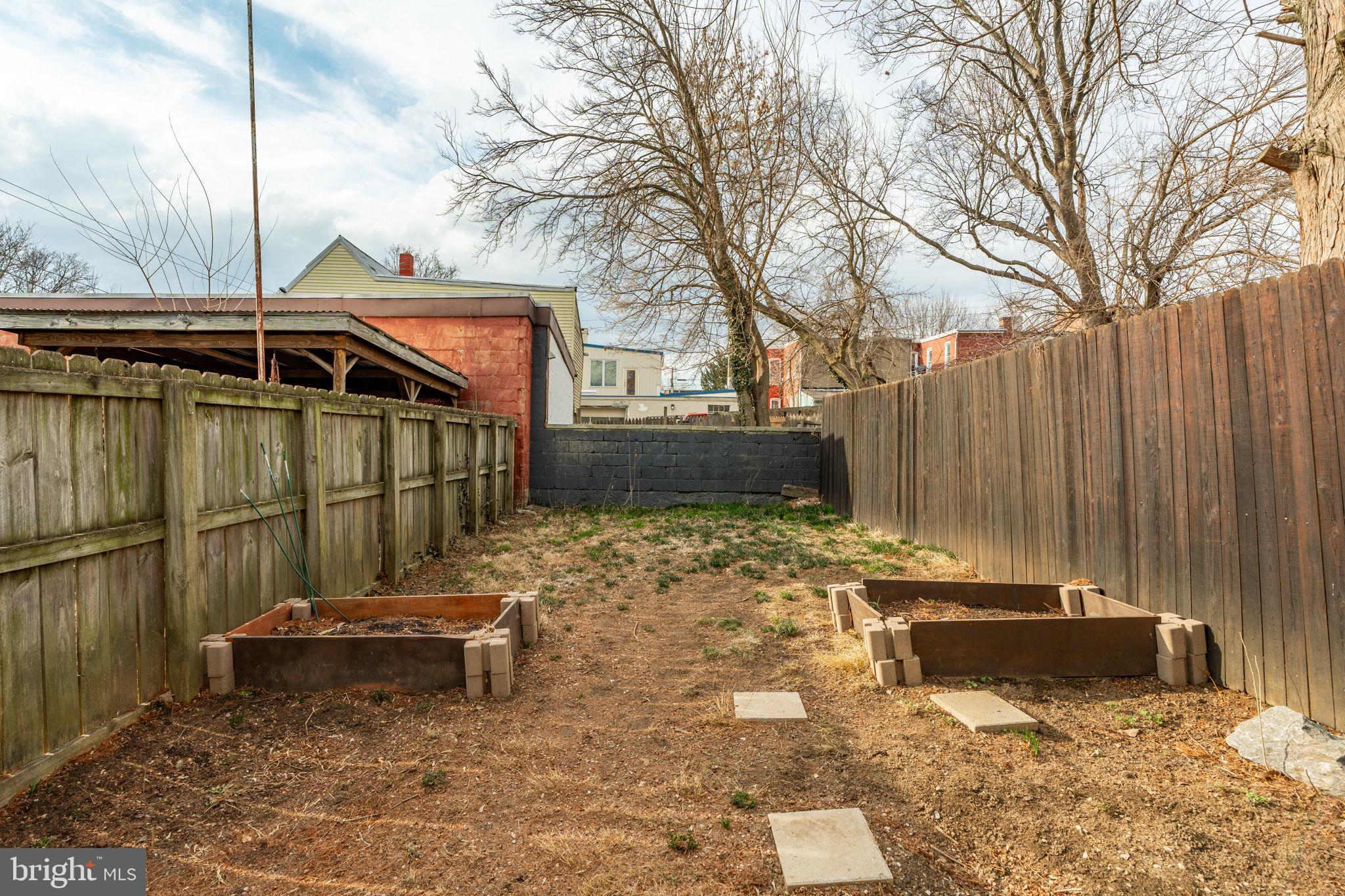 471 High Street Lancaster, PA 17603 - Photo 20 of 22 a front view of a house with a yard